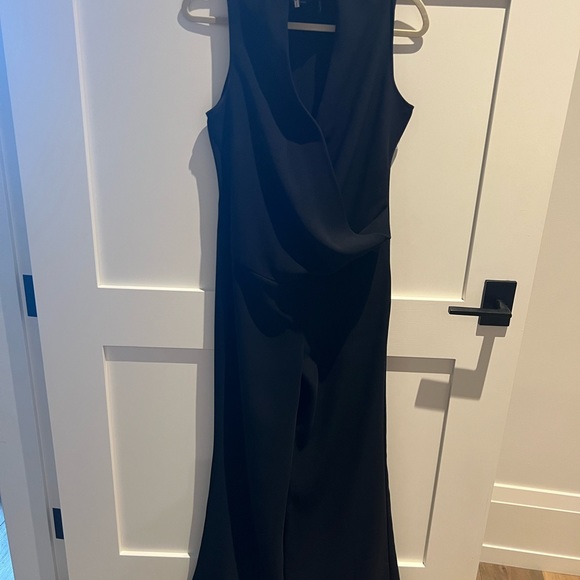 Black jumpsuit with flowy pant legs - Picture 2 of 4